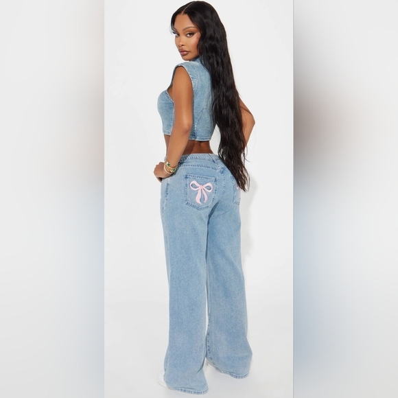 Stylish Blue Jeans with Pink Bow Accent. - Picture 6 of 6